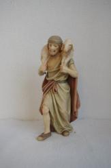 Hirt mit Schulterschaf 