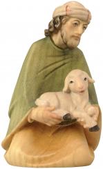 Hirte kniend mit Schaf 