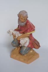 Sitzender Hirte mit Schaf 