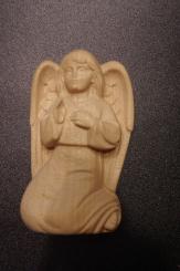 kniender Engel als Handschmeichler 