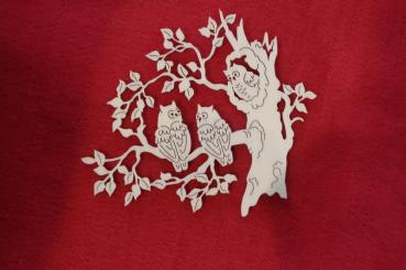 Drei Eulen auf dem Ast 