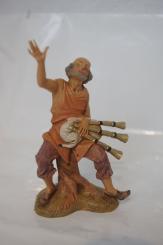 Sitzender Hirte mit Dudelsack. 