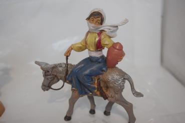 Hirtenmädchen auf Esel 