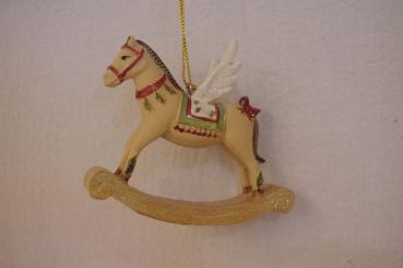 Schaukelpferd mit Flügeln 