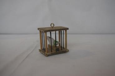 Vogelkäfig mit Vogel 