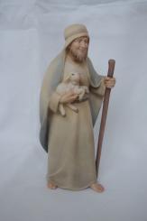 Hirte mit Stock und Lanmm 