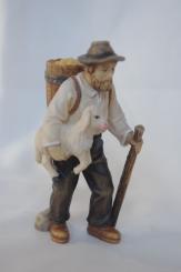 Hirte mit Lamm unter dem Arm 