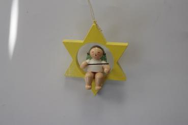 Engel mit Taktstock im Stern 