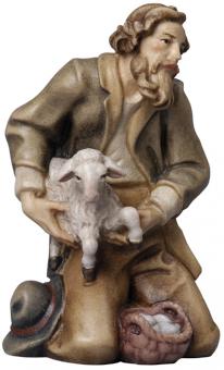 Hirte kniend mit Schaf 