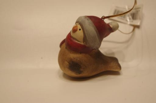 Keramikvogel mit roter Mütze 